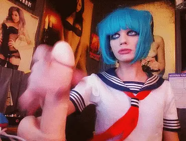 me stroking my dildo while on webcam in my sailor uniform and blue wig. porn gif