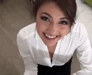 smiley brunette deepthroats porn gif