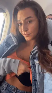 estephania ha boobs revealed in plane porn gif