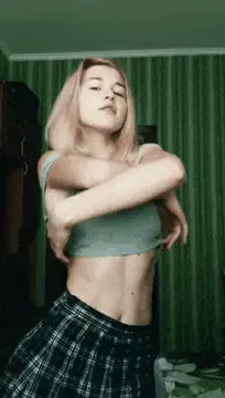 cute blonde striptease porn gif