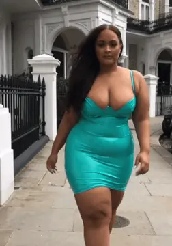 @therealnatalie in skin-tight dress walking porn gif