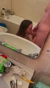 Girlfriend blowjob and takes cumshot in her mouth