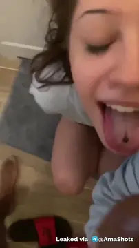 Skinny white girl sucking on a horse dick