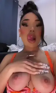 sexy latina playing with her titties
