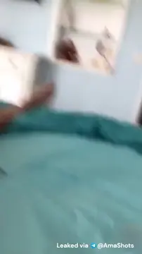 Her mom supporting her while she riding it