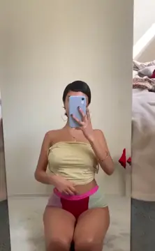 petite latina showing off her big titties