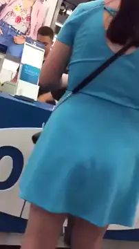 FLASHING BIG ASS UNDER SKIRT IN STORE PUBLIC