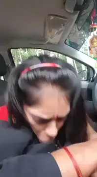 Indian babe sucks dick in the car before the event