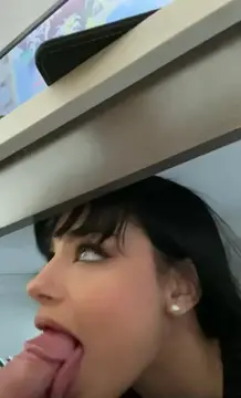 sexy secretary under the table surprising her boss