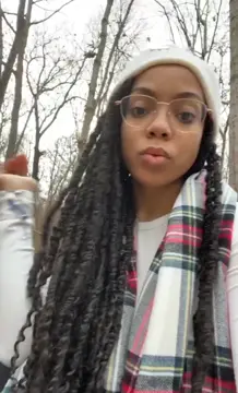 Ebony teen fucks herself in the woods