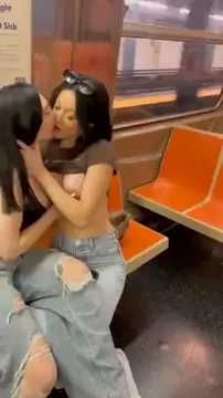 Brunette Girls Horny Kissing in train