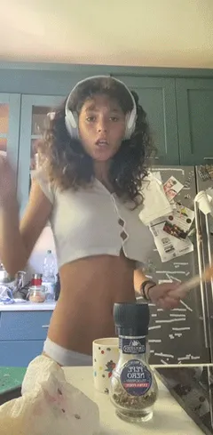 flawless teen making dinner