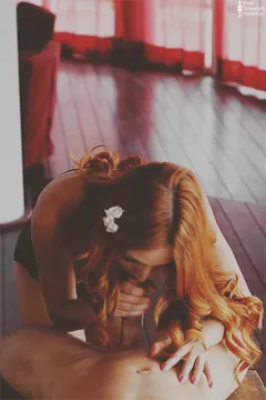 amazing blowjob gif with pretty long haired redhead babe.