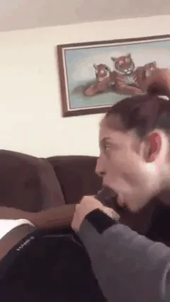 She can barely get it in her mouth