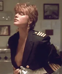 erika eleniak showing her ta-tas