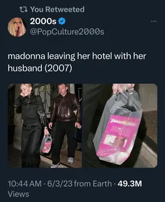 madonna leaving a hotel with her husband and a strapon. bad bitch.