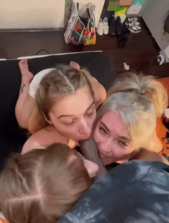 three sluts worshipping cock
