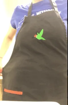 showing of her underbust corset at work