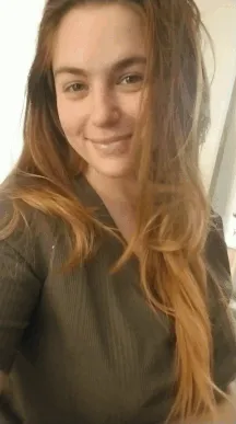 redhead shows her huge tits