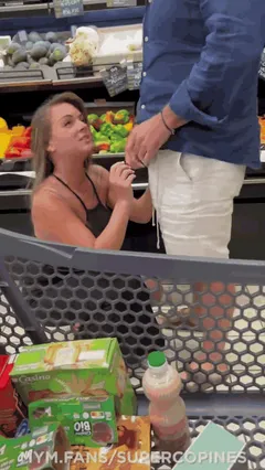 A couple is having fun right in the market PublicBlowjobs