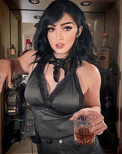 after drinking a little, she woke up on her knees with her cock in her mouth, where the flavors of many cocks and booze mingled