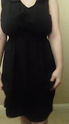 pulling her dress all the way up over her big tits
