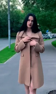 undresses in the park