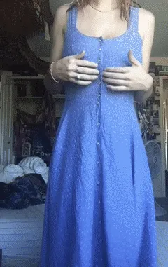 lady pulling her dress off exposing her huge tits