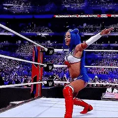sasha banks dressed as sailor moon doing the splits