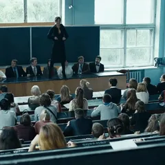 short haired babe stripping in class