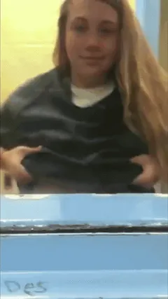 prison slut flashing tits during jail visit