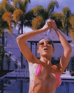 sexy asian bikini babe gets oiled
