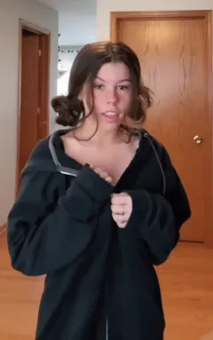 bethany jade - unzipping her hoodie