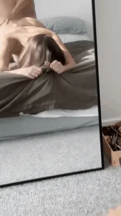In front of the mirror