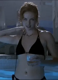charlize theron takes off her bikini.