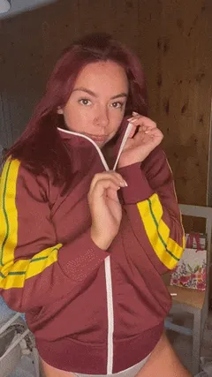 busty redhead unzips