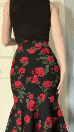 long skirt, no panties, fishnets with butt plug inserted
