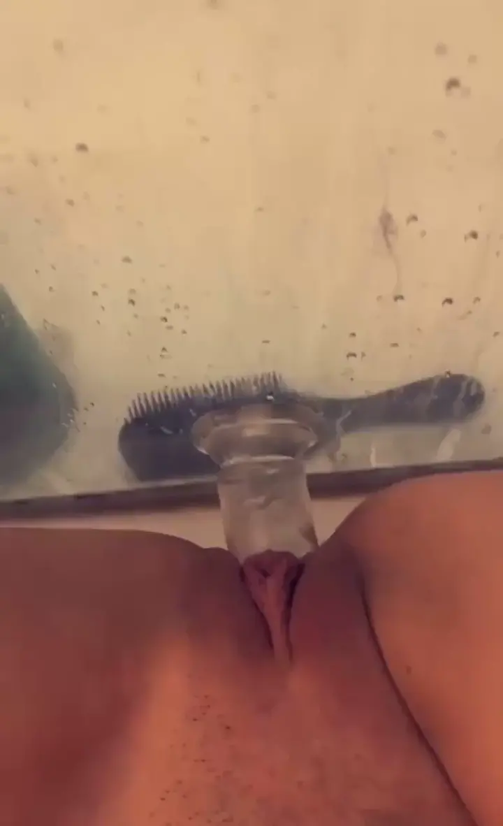 Brunette babe dildo show in shower